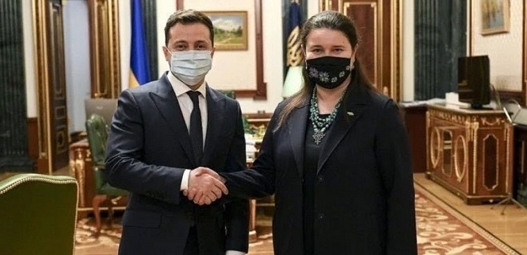 посол