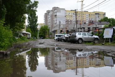 город