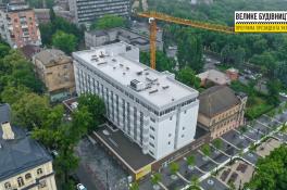 город
